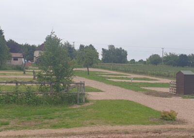 Bredon-Vale Caravan and Camping, view of the Paddock area from the Orchard area